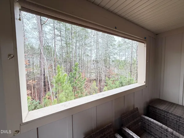 a room with furniture and a window