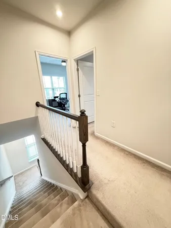 a view of a hallway with a large window