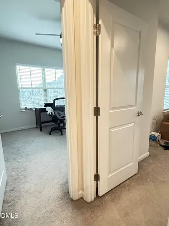 a view of room with furniture and windows