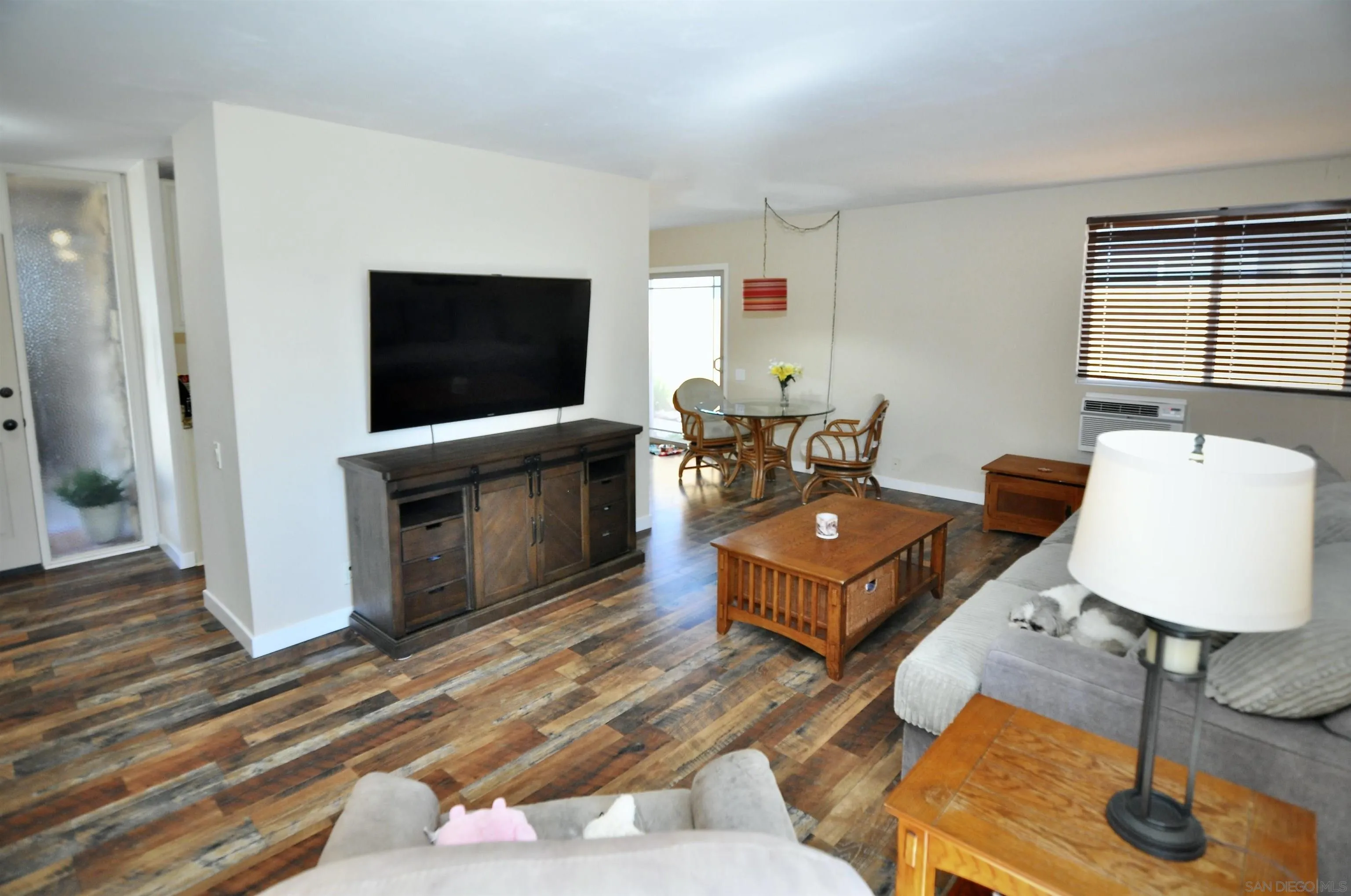 14333 Lolin Lane Poway, CA 92064 - Photo 12 of 41 a living room with furniture and a flat screen tv