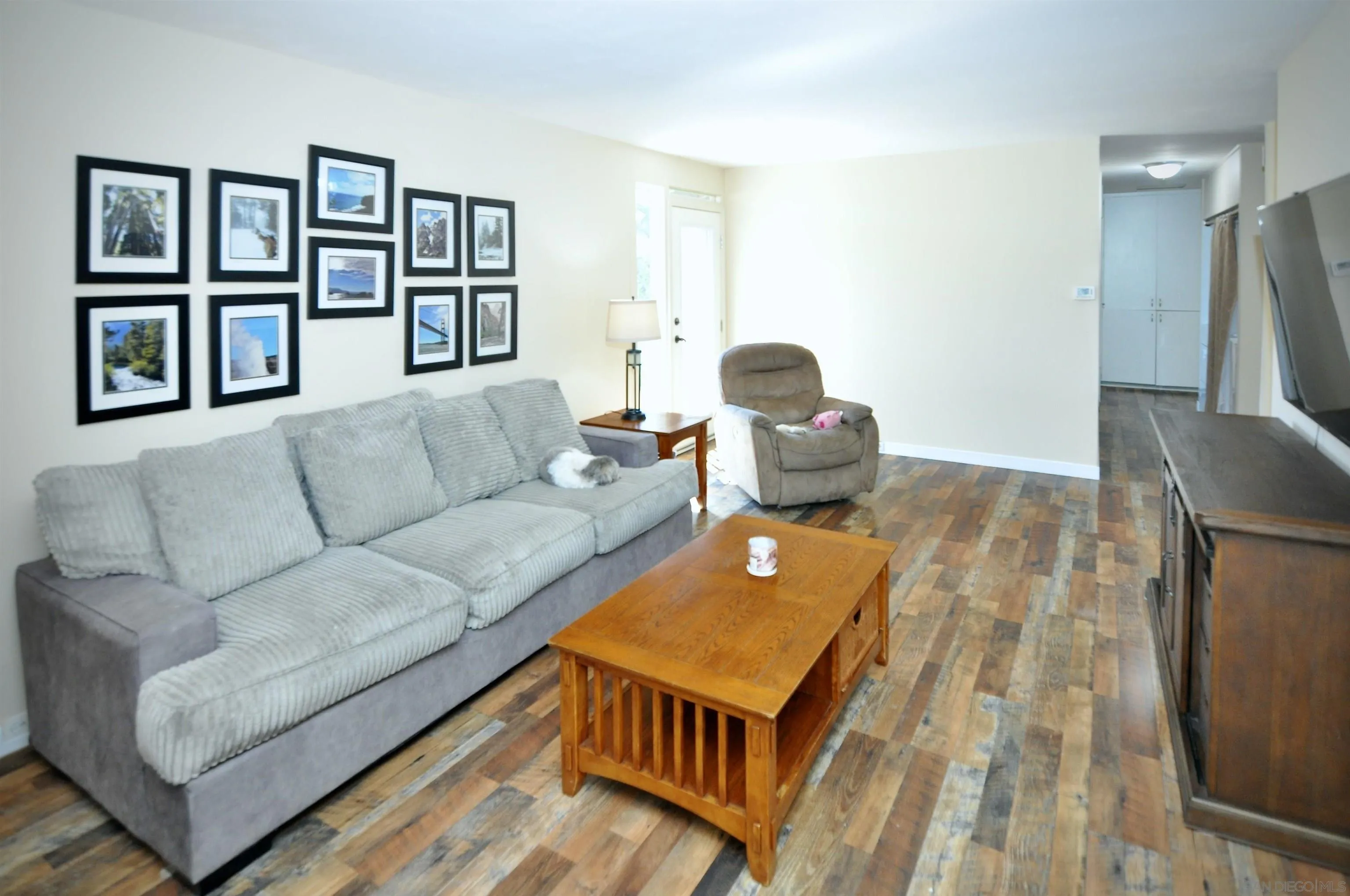 14333 Lolin Lane Poway, CA 92064 - Photo 15 of 41 a living room with furniture and a flat screen tv
