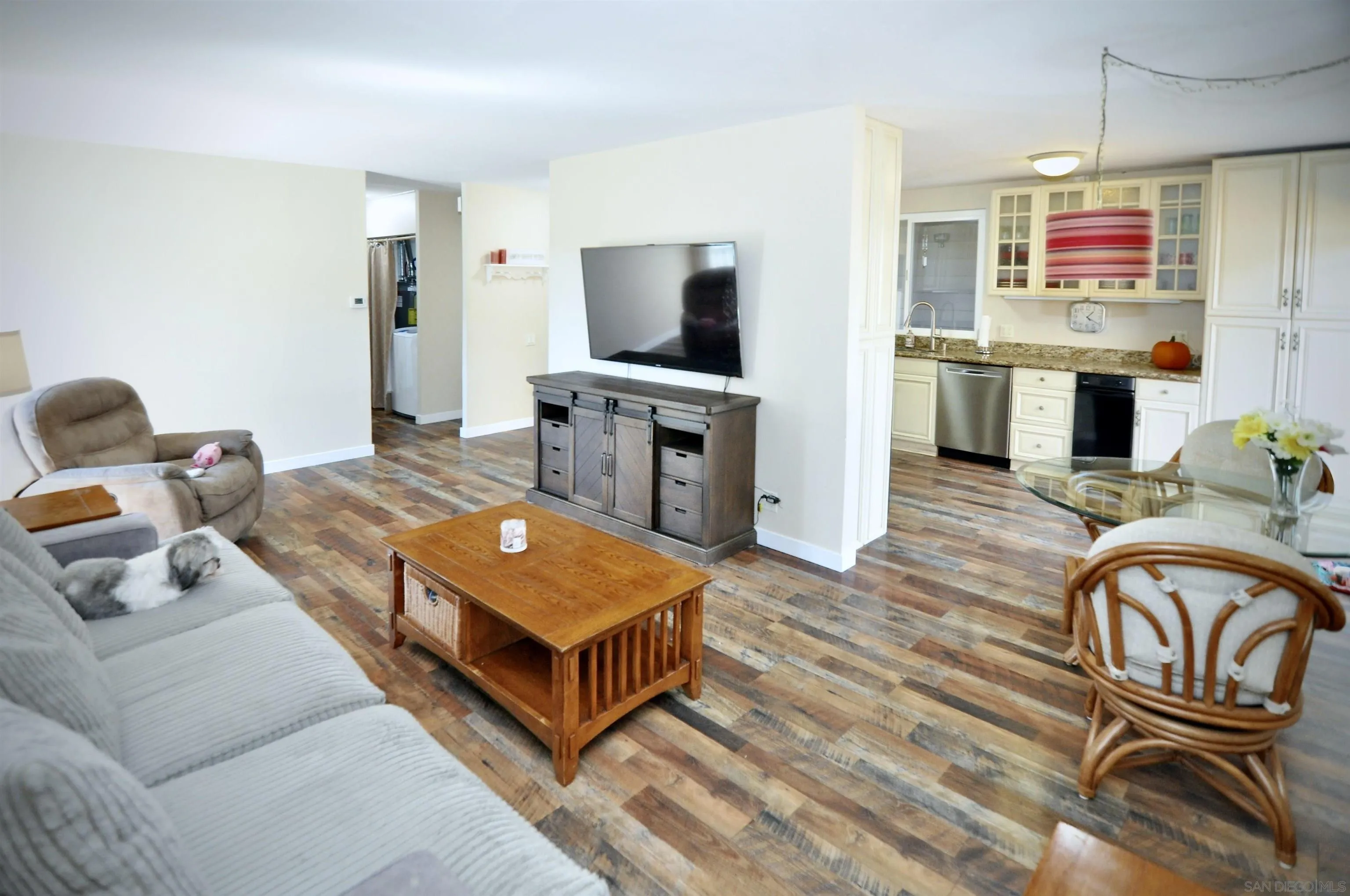 14333 Lolin Lane Poway, CA 92064 - Photo 16 of 41 a living room with furniture and a flat screen tv