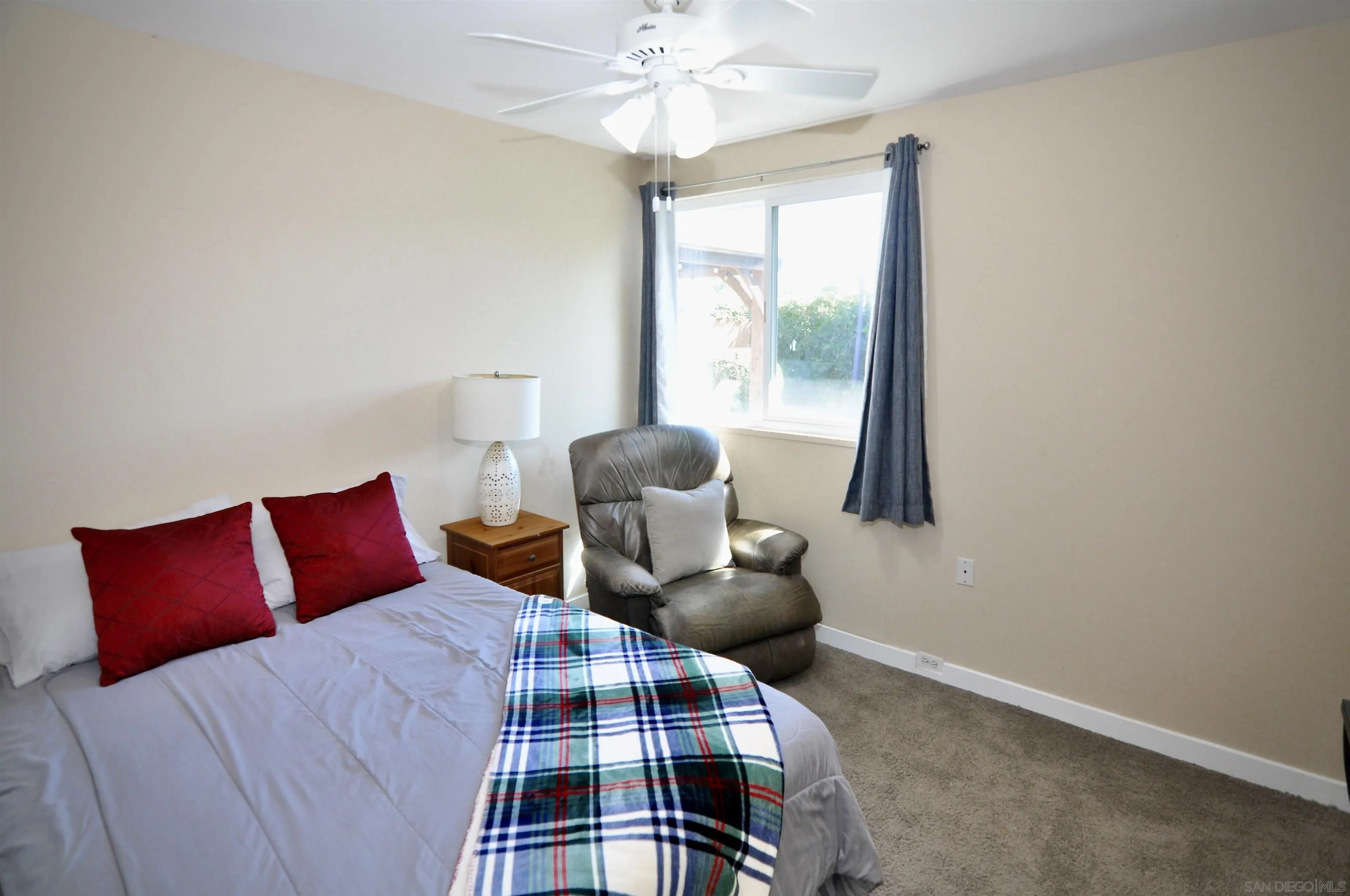 14333 Lolin Lane Poway, CA 92064 - Photo 18 of 41 a bedroom with a bed and a window