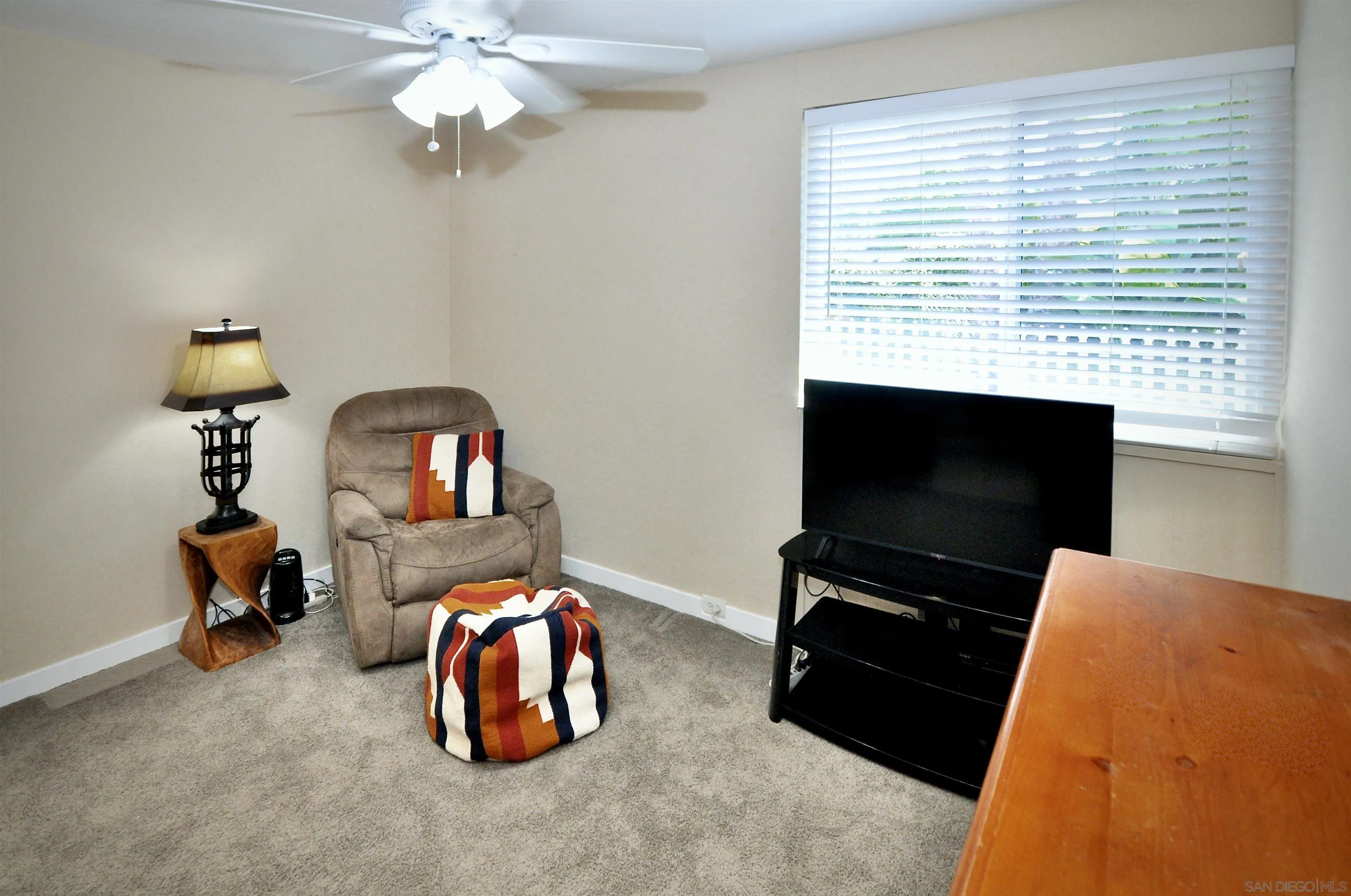 14333 Lolin Lane Poway, CA 92064 - Photo 21 of 41 a bedroom with furniture and a flat screen tv