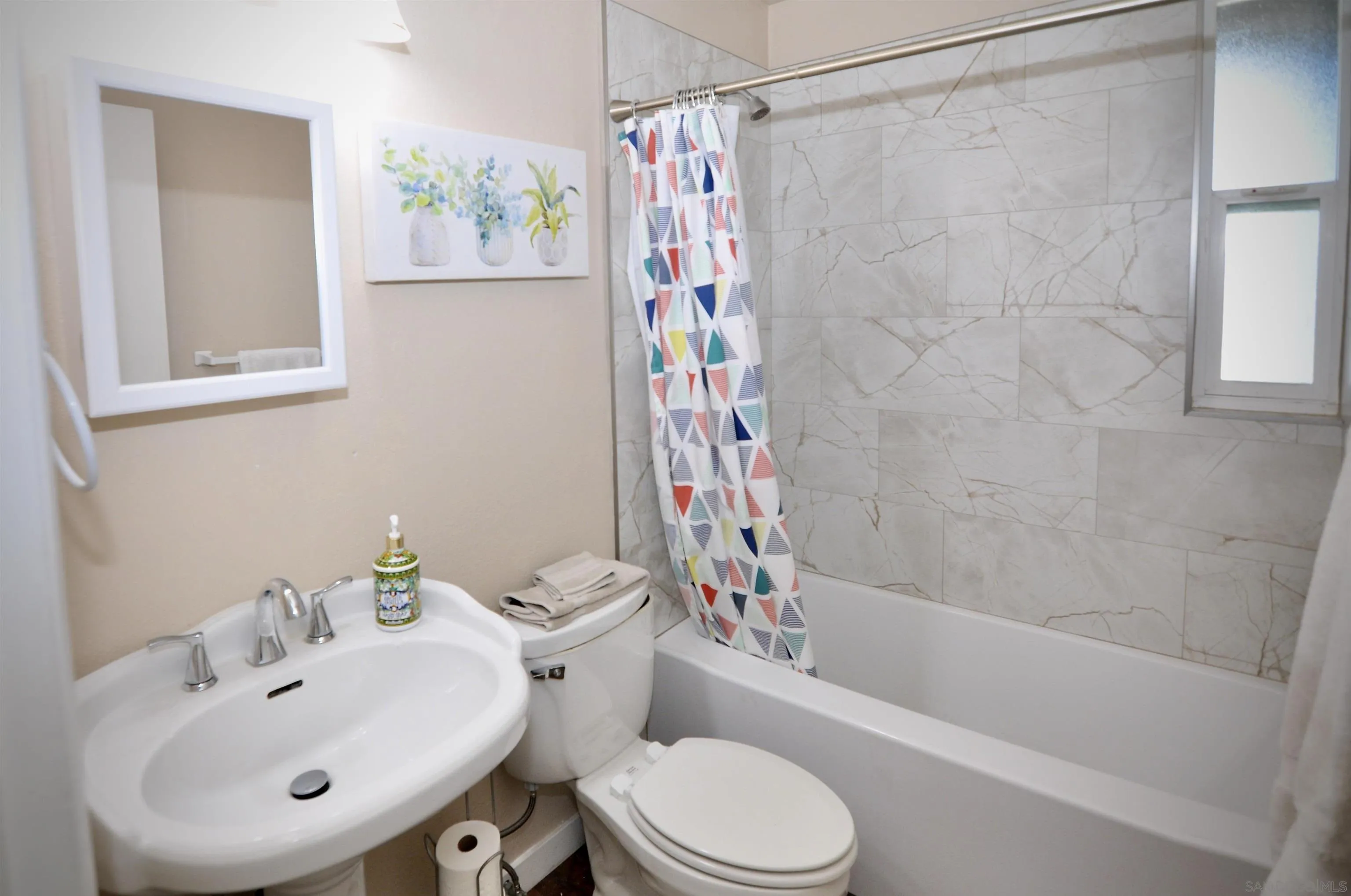 14333 Lolin Lane Poway, CA 92064 - Photo 36 of 41 a bathroom with a sink toilet and shower