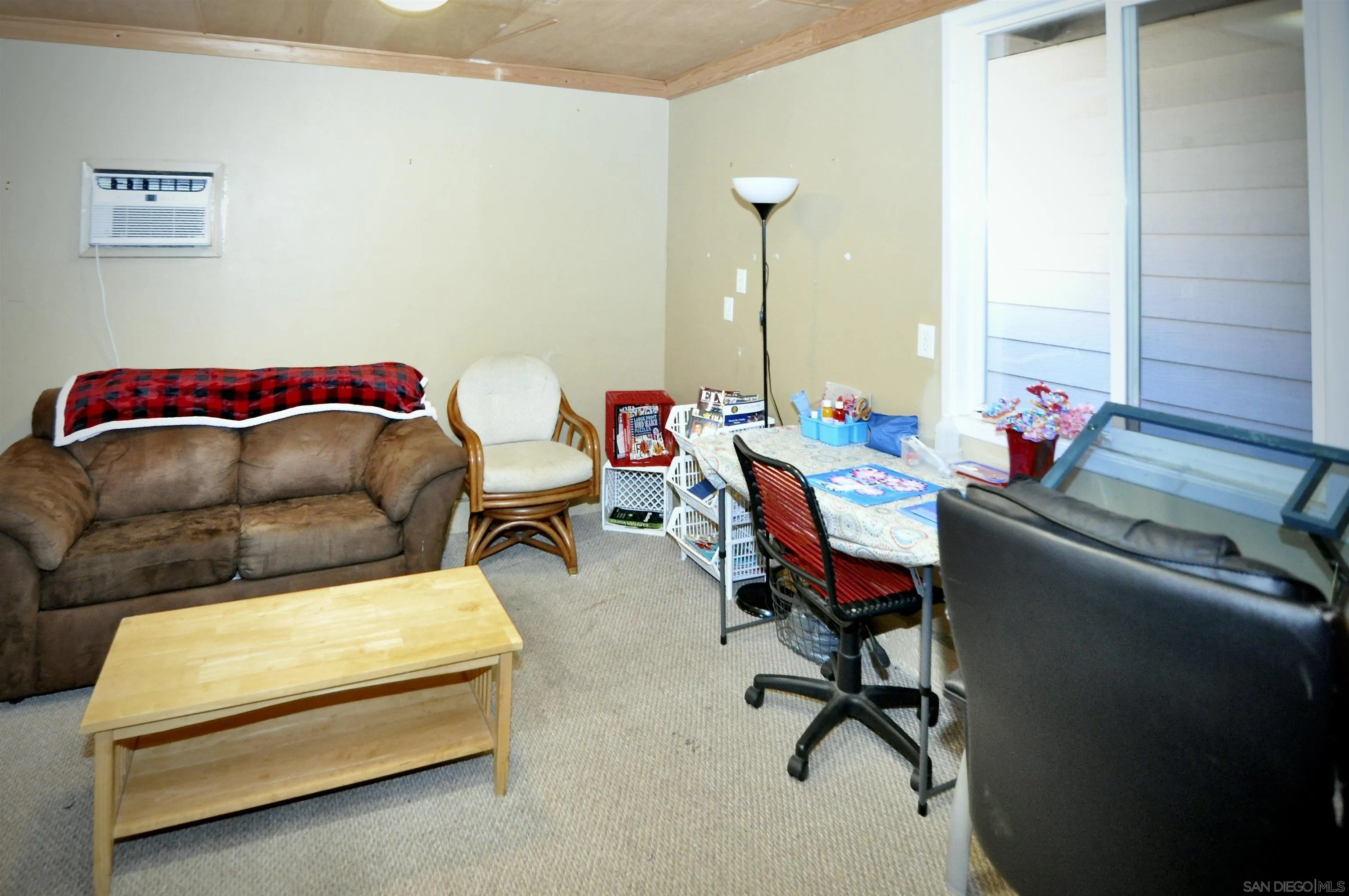 14333 Lolin Lane Poway, CA 92064 - Photo 38 of 41 a living room with furniture and a rug