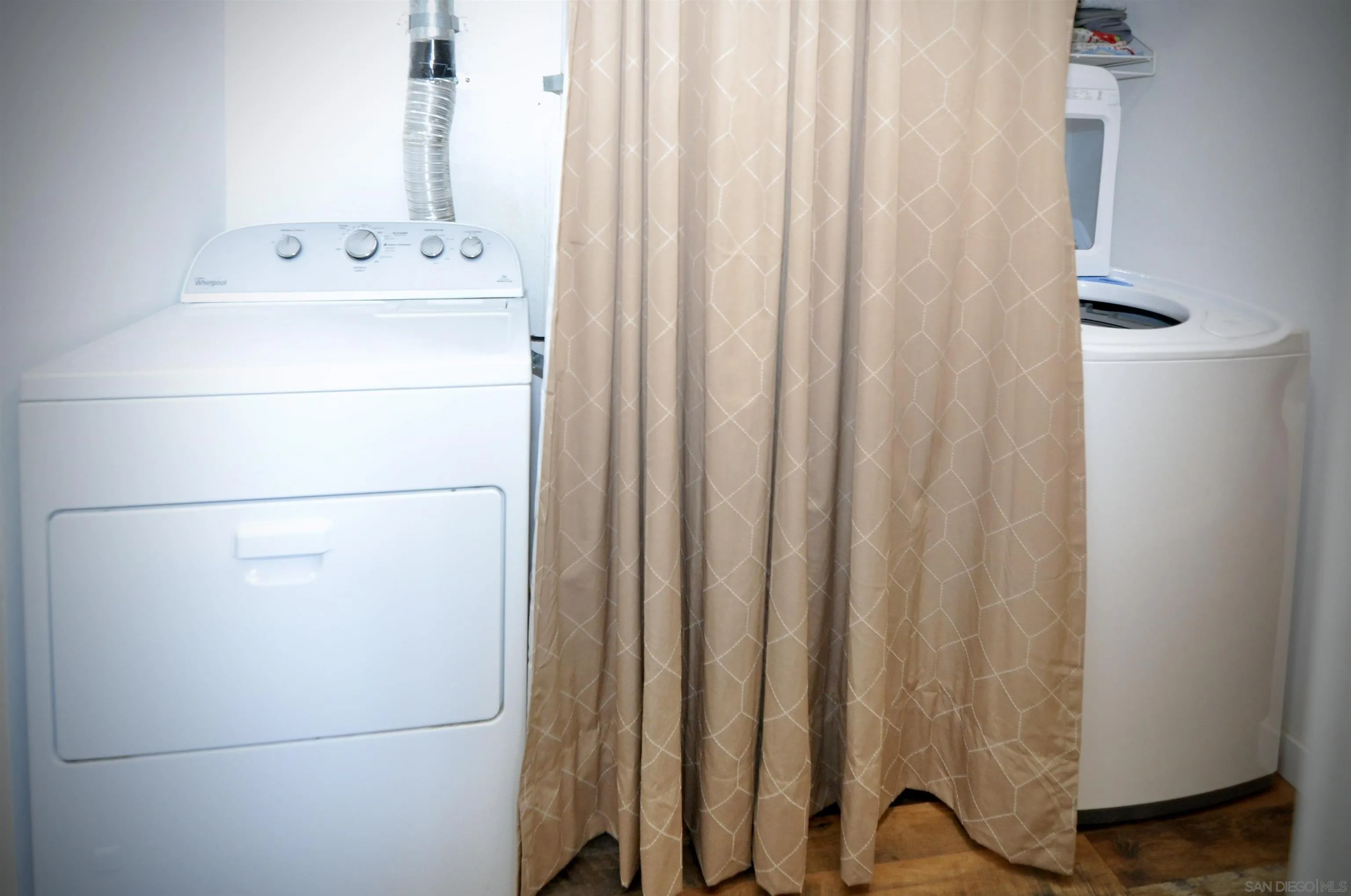 14333 Lolin Lane Poway, CA 92064 - Photo 41 of 41 a utility room with dryer and washer