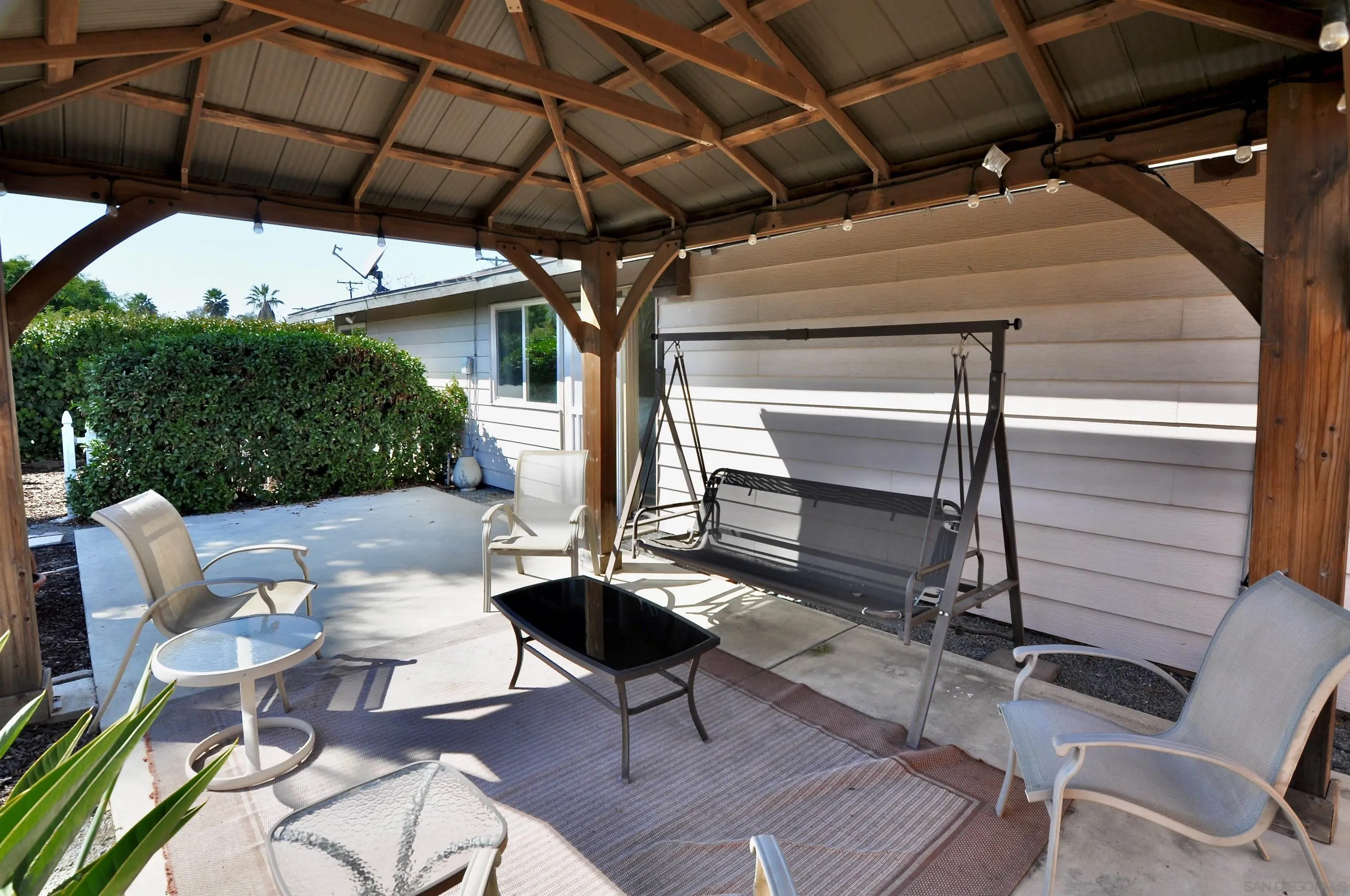 14333 Lolin Lane Poway, CA 92064 - Photo 5 of 41 a patio with table and chairs