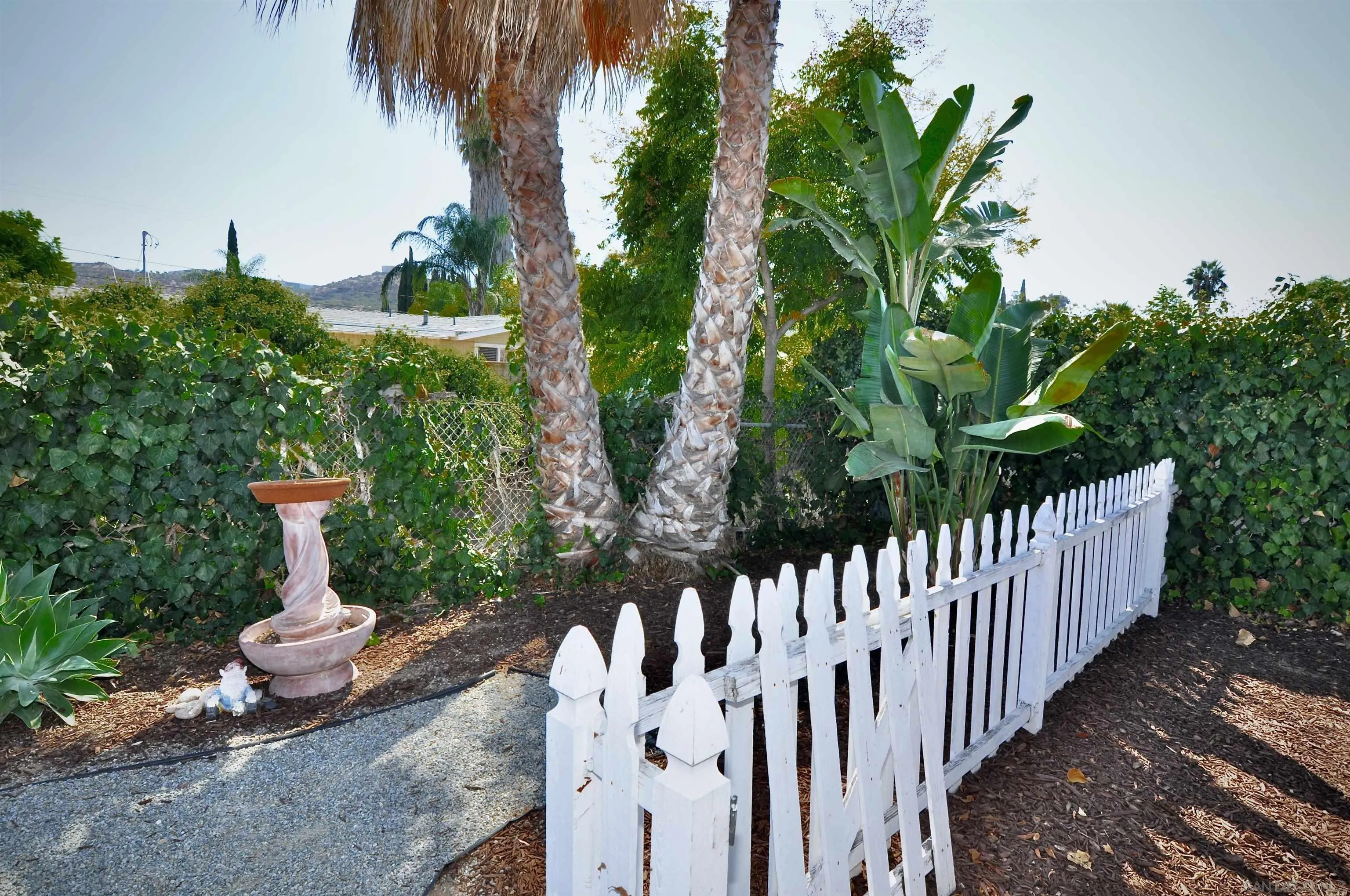 14333 Lolin Lane Poway, CA 92064 - Photo 8 of 41 a view of a garden with wooden fence