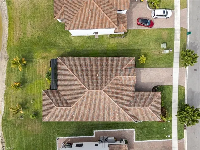 an aerial view of a house with a garden