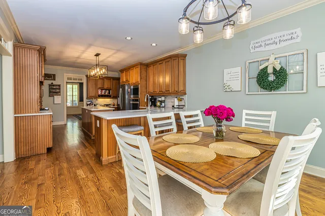 a kitchen that has a sink and a stove