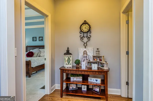 a spacious bathroom with a tub sink shower and mirror