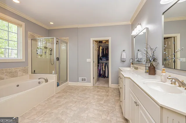 a bathroom with a sink a toilet and shower curtain