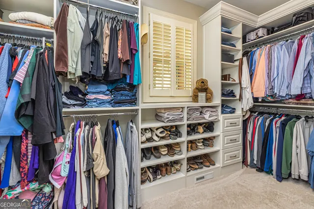 a bedroom with furniture and a bed