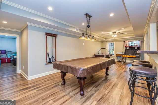 an aerial view of a house with swimming pool