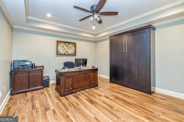 a aerial view of a house with a yard