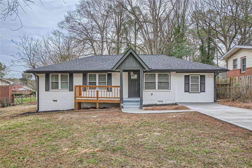2091 Parker Ranch Road Southeast Atlanta, GA 30316 - Photo 1 of 1 a front view of a house with a garden