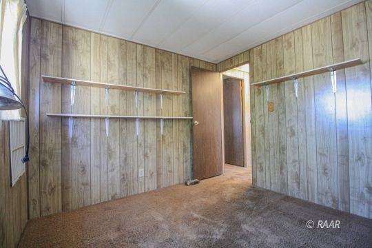 1313 North Leroy Street Ridgecrest, CA 93555 - Photo 17 of 27 a view of a wooden door