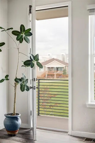 a vase of flowers sitting next to a window