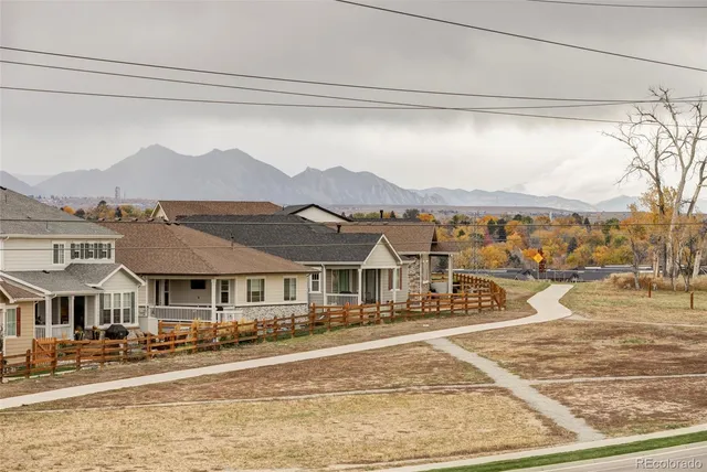 a view of an ocean and a mountain
