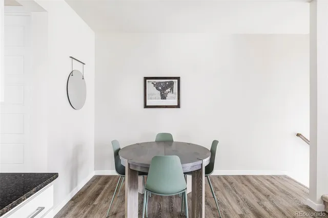 a workspace with furniture and wooden floor
