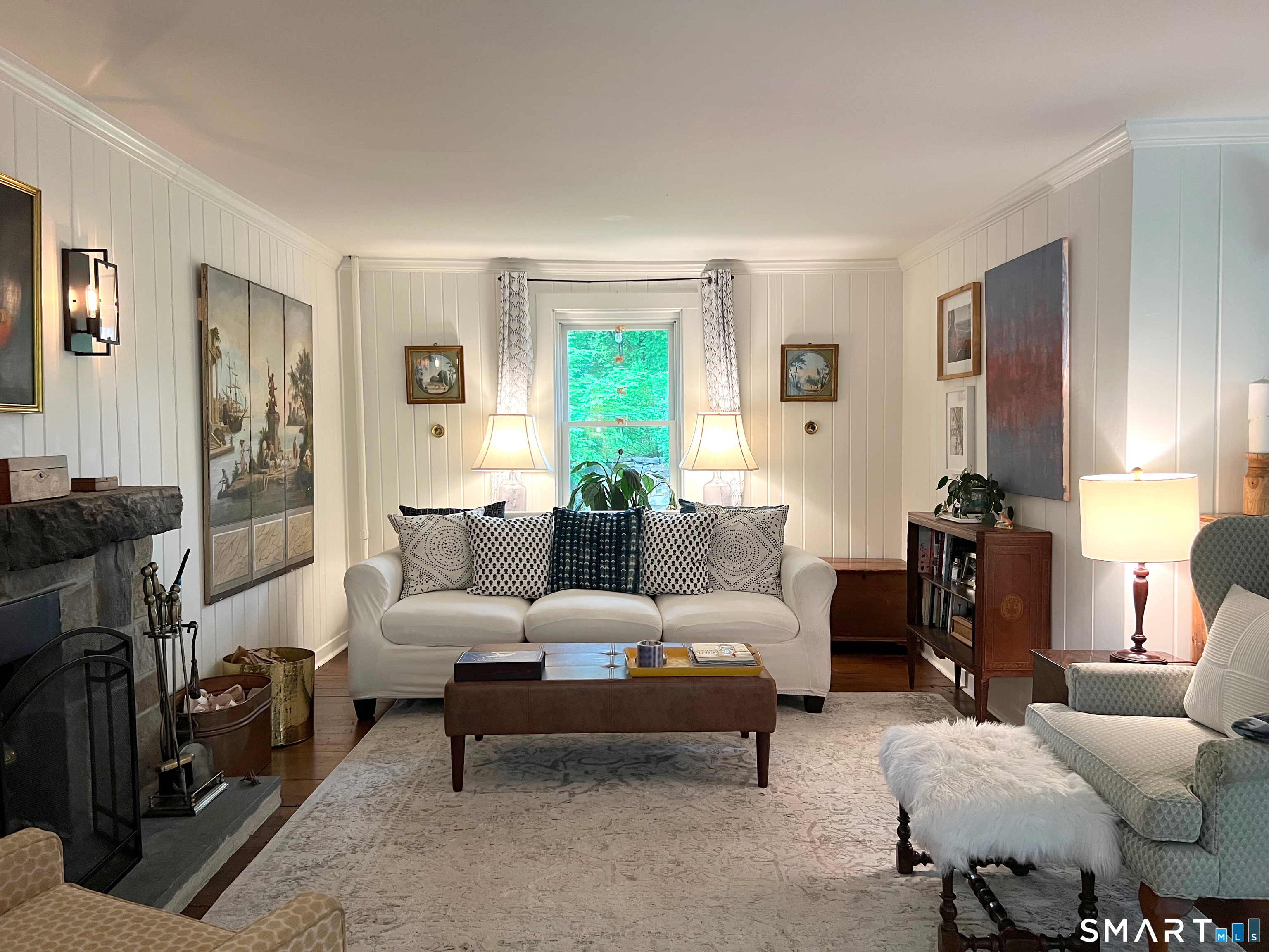 269 Farmingville Road Ridgefield, CT 06877 - Photo 6 of 17 a living room with furniture and a large window
