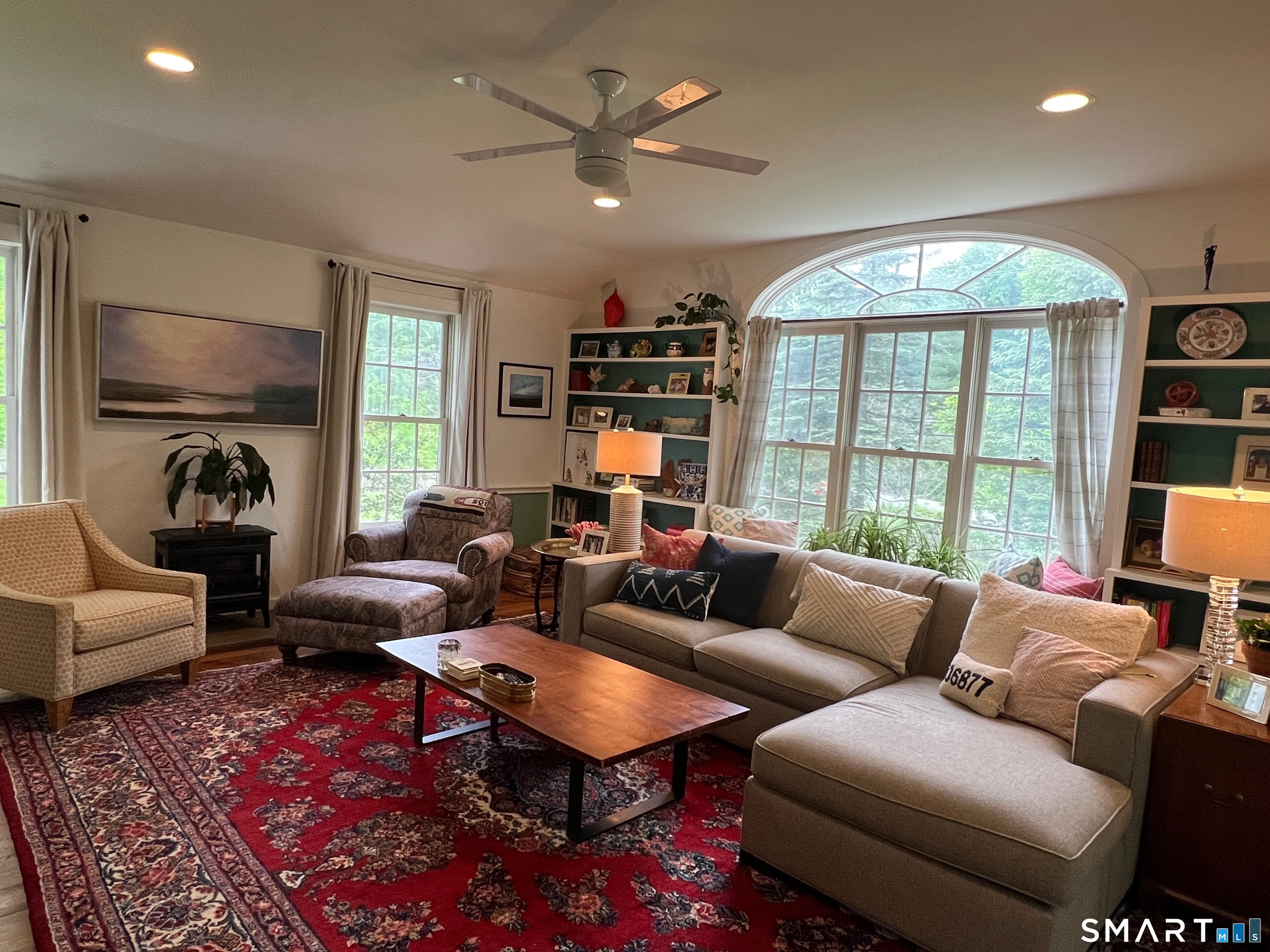 269 Farmingville Road Ridgefield, CT 06877 - Photo 8 of 17 a living room with furniture fireplace and a large window
