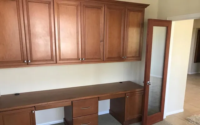 a view of a bathroom from a hallway