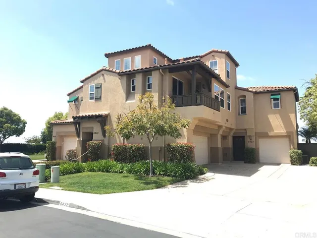 a view of house with yard