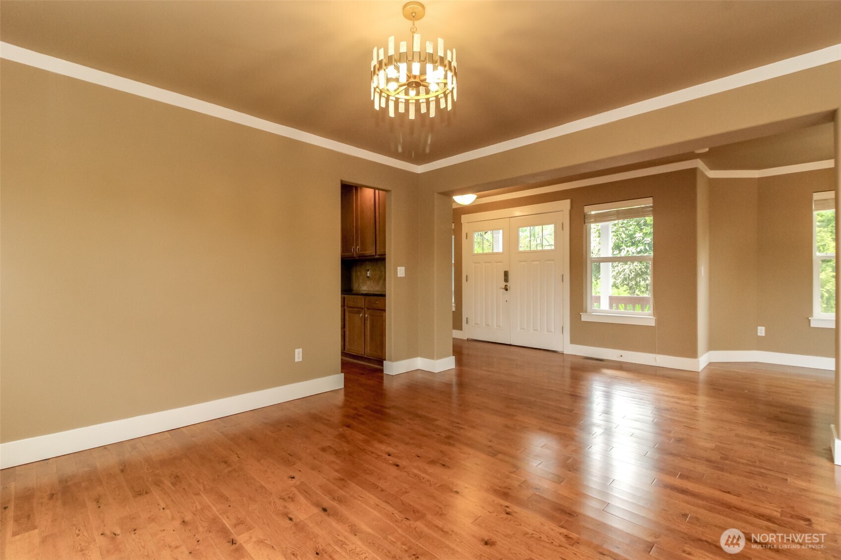 3000 South Mt Baker Boulevard Seattle, WA 98144 - Photo 8 of 40 a view of an empty room with window and wooden floor