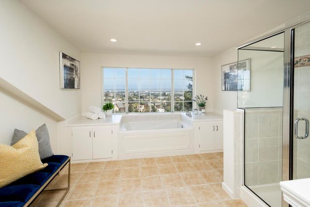 a bathroom with a bathtub and a sink