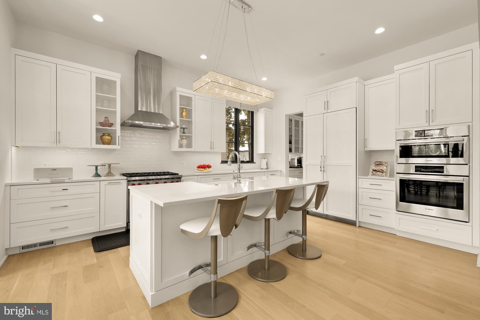 7613 Glenbrook Road Bethesda, MD 20814 - Photo 24 of 90 a kitchen with a sink microwave and cabinets