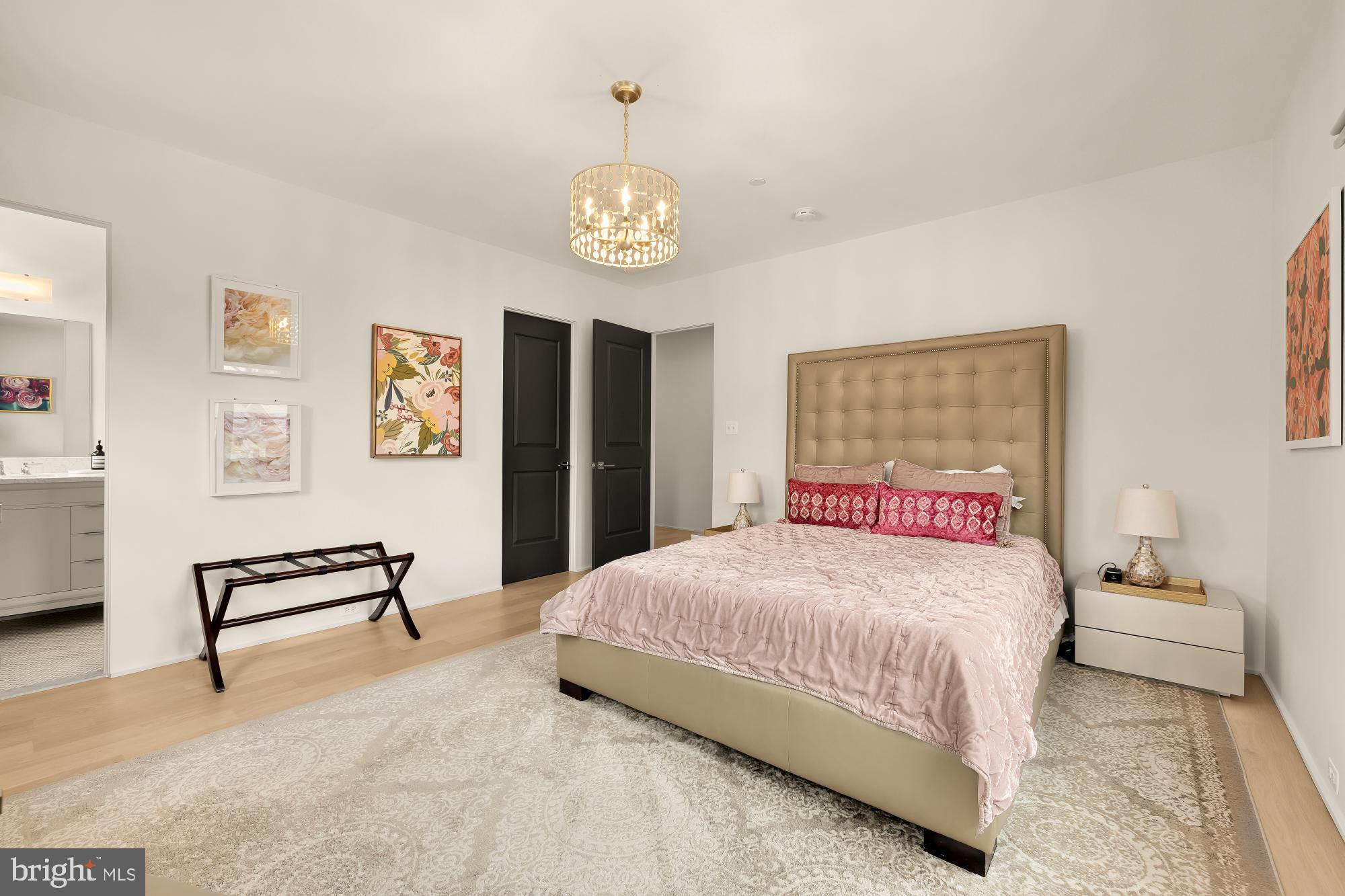 7613 Glenbrook Road Bethesda, MD 20814 - Photo 54 of 90 a bedroom with a bed and a table