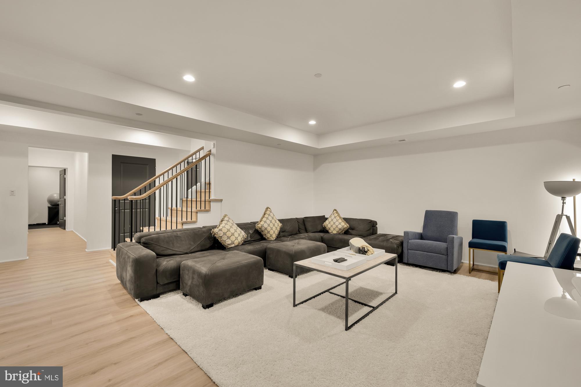 7613 Glenbrook Road Bethesda, MD 20814 - Photo 67 of 90 a living room with furniture and a wooden floor