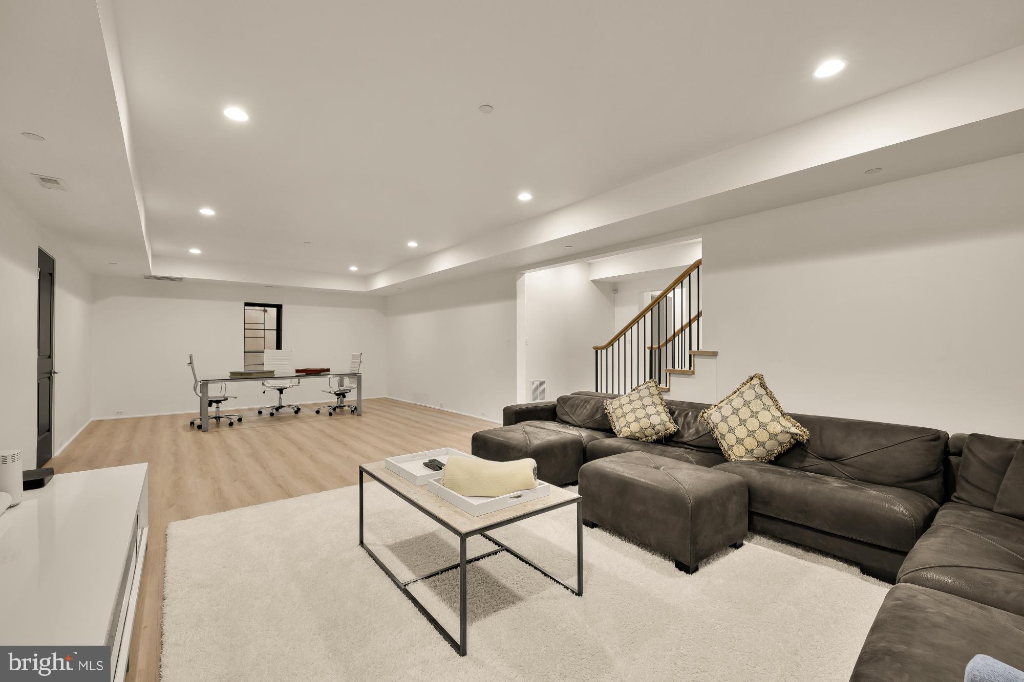 7613 Glenbrook Road Bethesda, MD 20814 - Photo 69 of 90 a living room with furniture and a couch