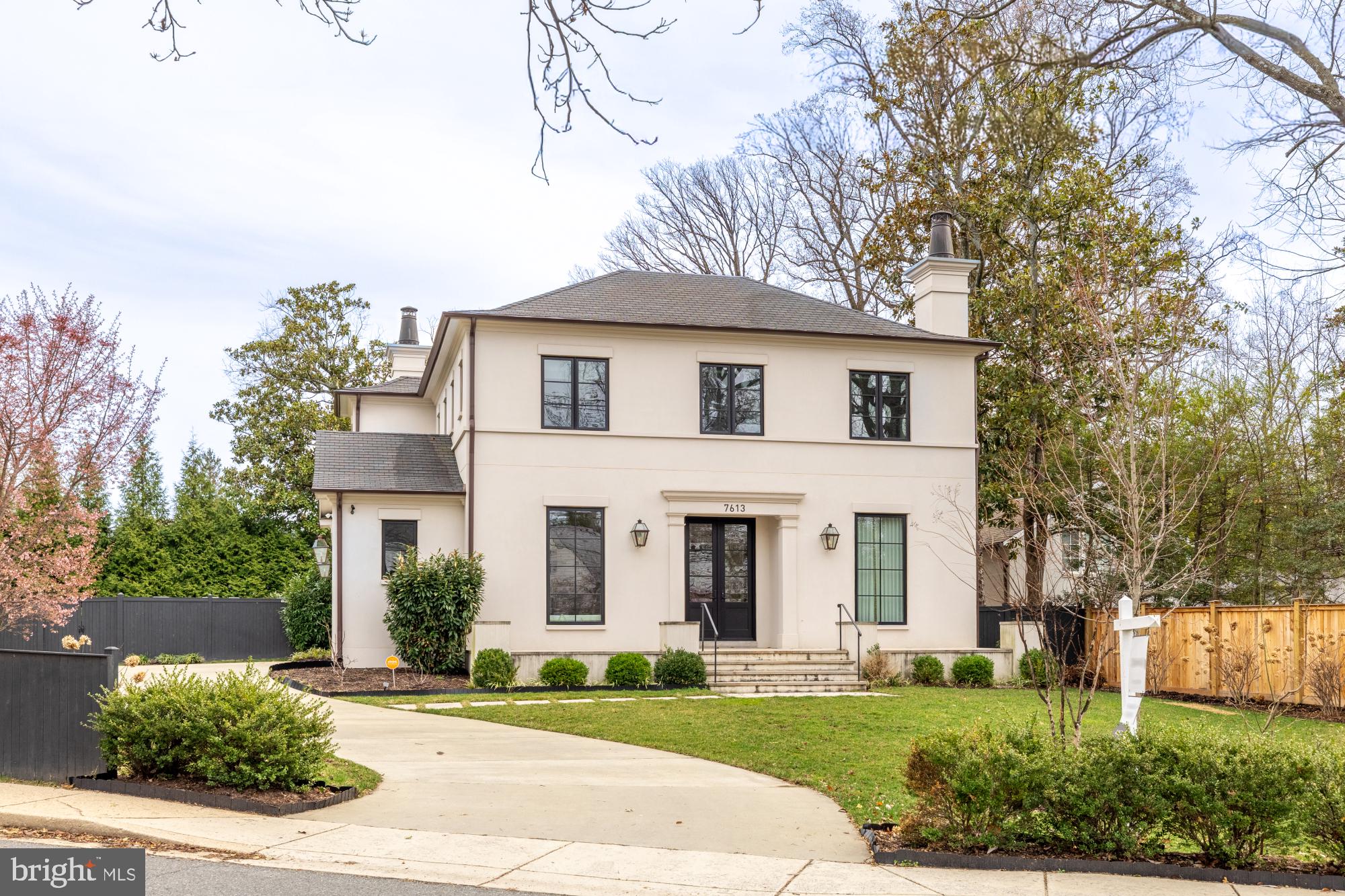 7613 Glenbrook Road Bethesda, MD 20814 - Photo 84 of 90 front view of a house with a yard