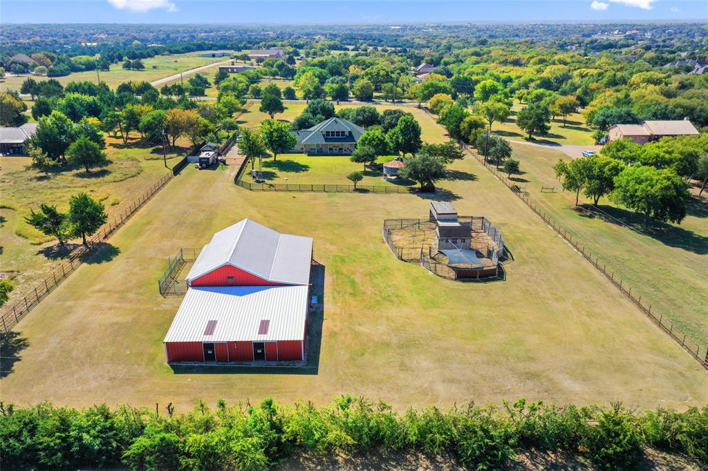 4451 Shiloh Road Midlothian, TX 76065 - Photo 5 of 39 Aerial view from backside of property. The lot size is 4.3 acres and is crossed fenced on both sides of the house for use of front pasture and back pasture.