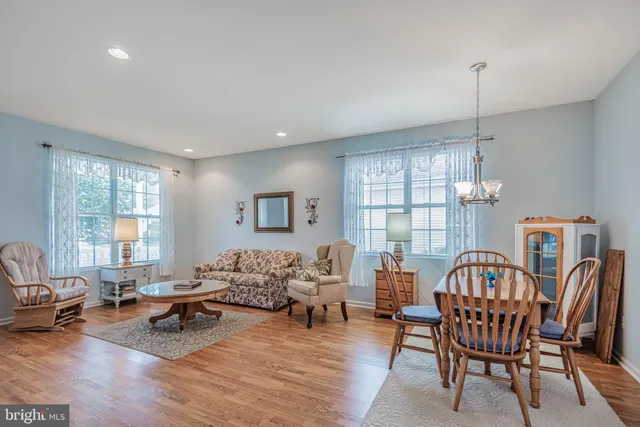 a living room with furniture and window