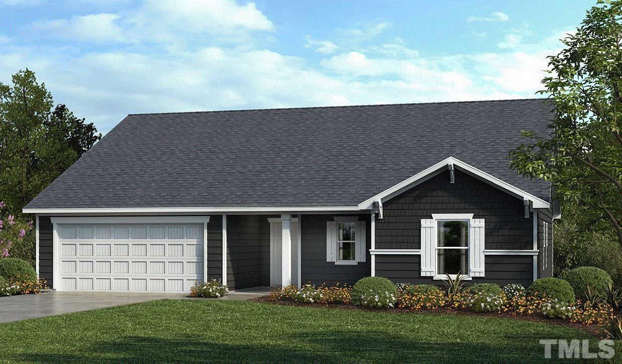 342 Rio Grande Lane Willow Spring, NC 27592 - Photo 1 of 9 a view of a house with garden and yard