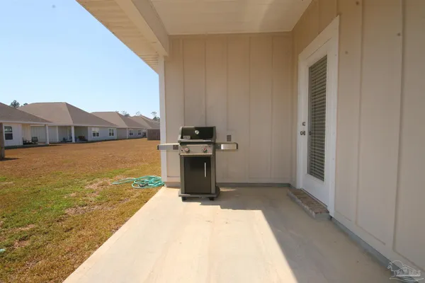a view of back yard of the house