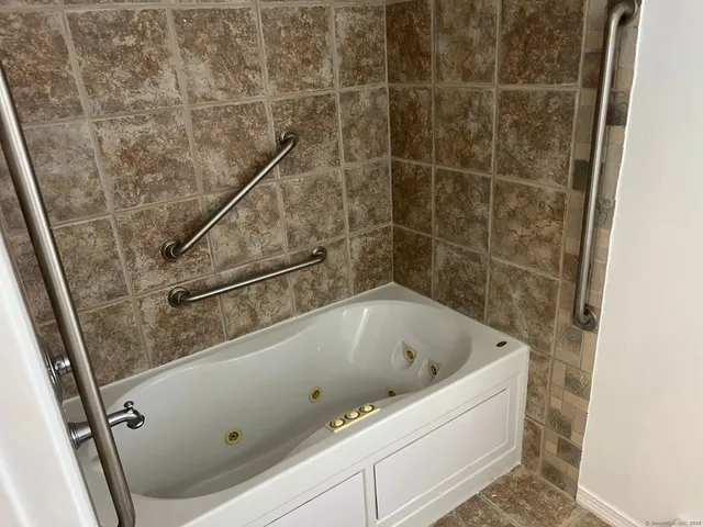 a bathroom with a bathtub
