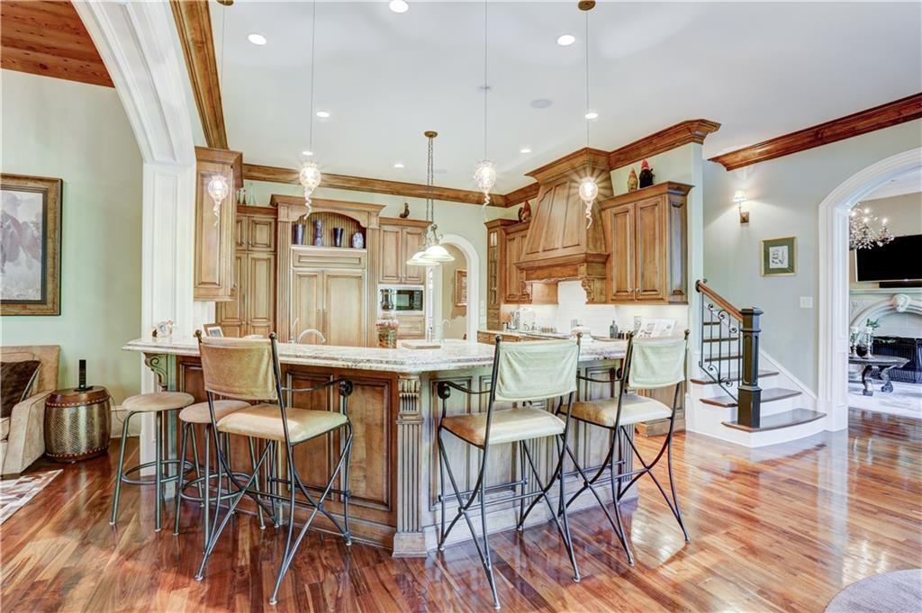 3455 Rivers Call Boulevard Atlanta, GA 30339 - Photo 19 of 53 a view of a dining room with furniture and wooden floor