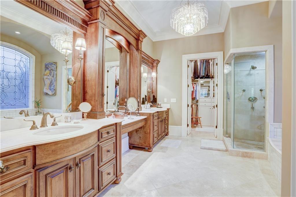 3455 Rivers Call Boulevard Atlanta, GA 30339 - Photo 30 of 53 a spacious bathroom with a double vanity sink mirror and double