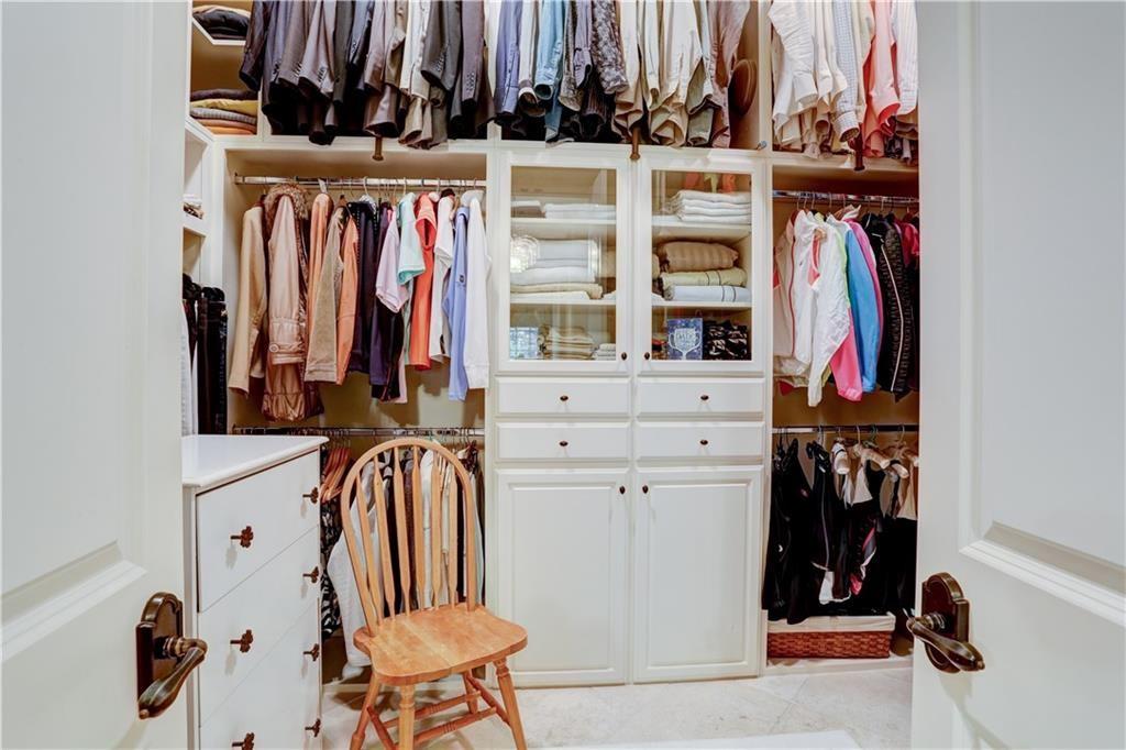 3455 Rivers Call Boulevard Atlanta, GA 30339 - Photo 32 of 53 a view of walk in closet with clothes and shoes