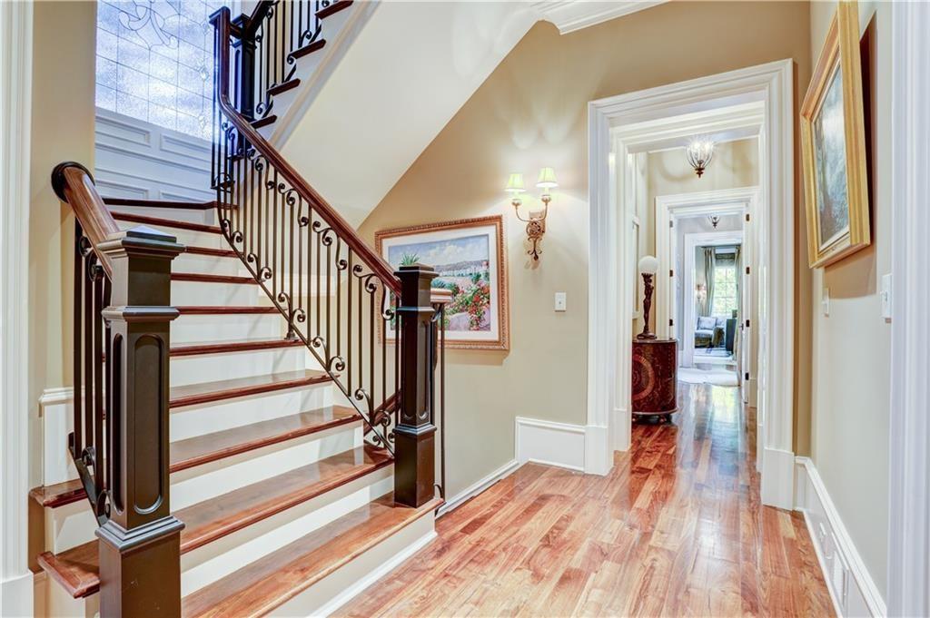 3455 Rivers Call Boulevard Atlanta, GA 30339 - Photo 34 of 53 a view of a hallway with wooden floor and staircase
