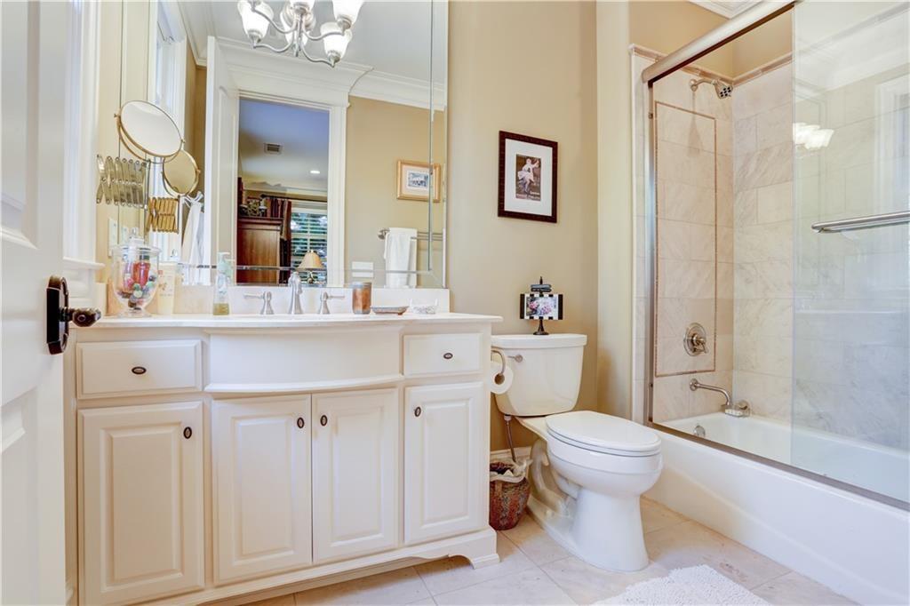 3455 Rivers Call Boulevard Atlanta, GA 30339 - Photo 39 of 53 a bathroom with a sink toilet vanity and shower