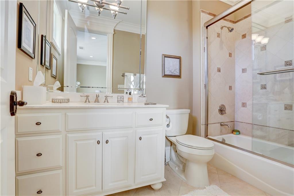 3455 Rivers Call Boulevard Atlanta, GA 30339 - Photo 43 of 53 a bathroom with a sink a toilet and shower