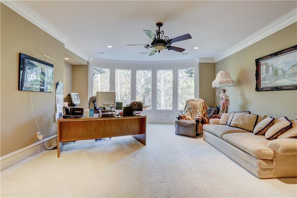 3455 Rivers Call Boulevard Atlanta, GA 30339 - Photo 46 of 53 a living room with furniture and a large window