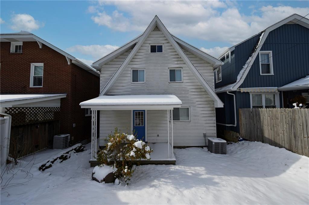 1620 Ridge Avenue New Kensington, PA 15068 - Photo 27 of 33 a front view of a house with a yard and seating space