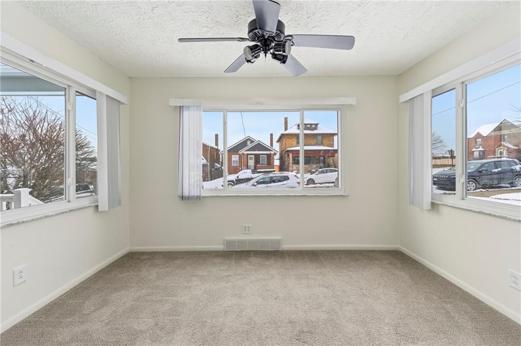 1620 Ridge Avenue New Kensington, PA 15068 - Photo 6 of 33 a view of room with window and ceiling fan